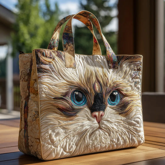 Bolso blanco hecho a mano con forma de gato y ojos azules.