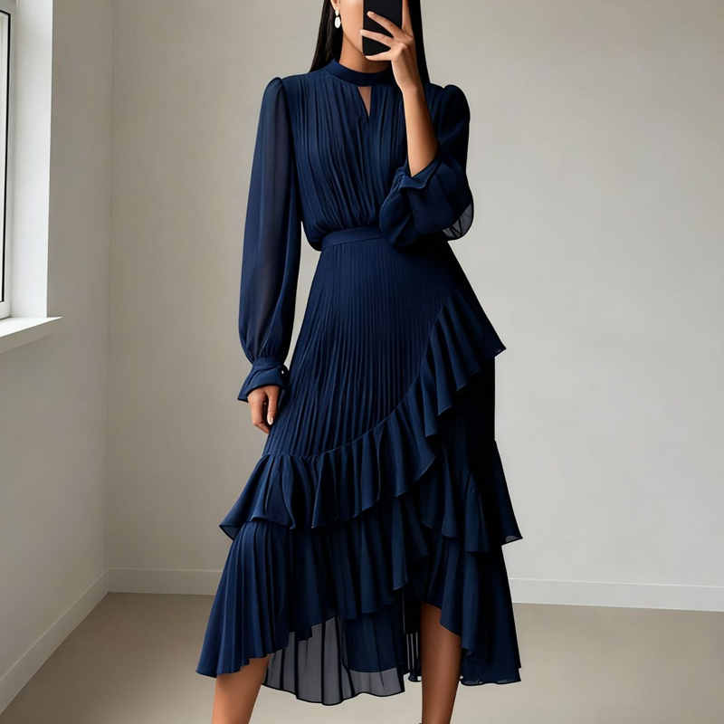 Elegante vestido midi plisado con volantes.